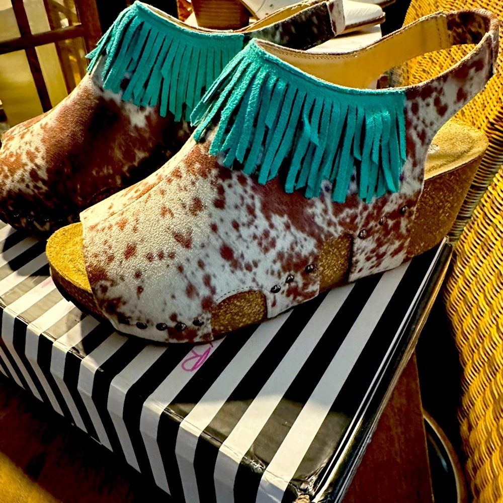 Crazy Train Hair on w fringe. Never worn clog like shoes. Beautiful.